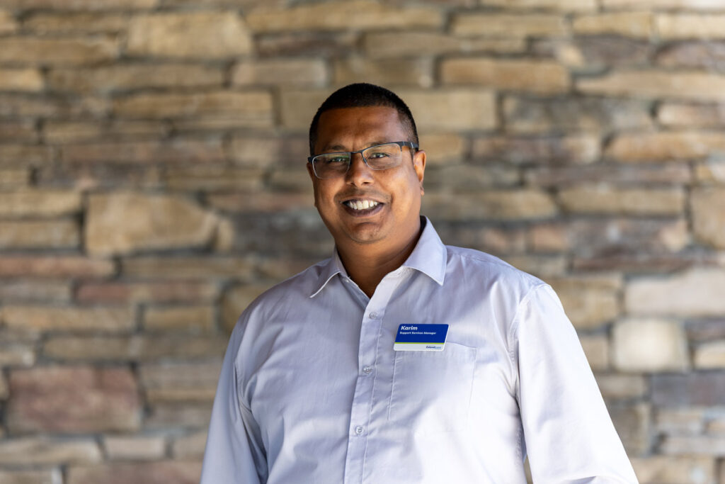 Healthcare professional in a collared shirt